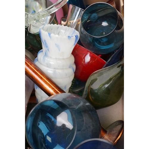 554 - A group of coloured glass to include vases,candlestick glasses etc.