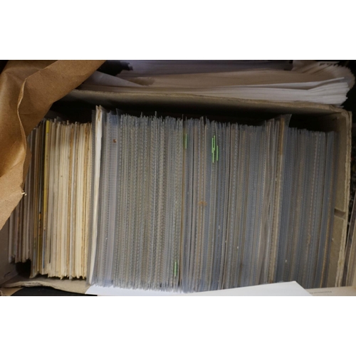 556 - A large collection of mixed ephemera contained within three boxes to include Postcards, press photog... 