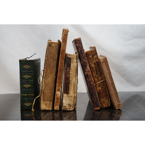 558 - A small collection of antique books to include Everybody' book of correct conduct and the book of co... 