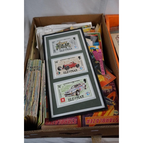 564 - A large collection of mixed ephemera contained within two boxes to include comics, postcards and tea... 