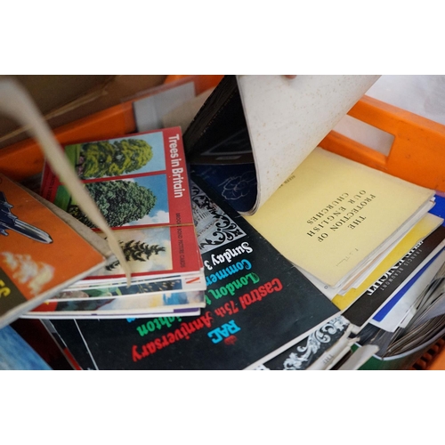 564 - A large collection of mixed ephemera contained within two boxes to include comics, postcards and tea... 