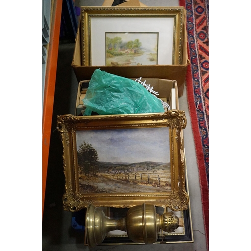 566 - A group of mixed collectables to include framed paintings and an oil lamp.