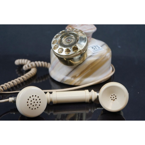 573 - A vintage style dial up telephone with onyx base.