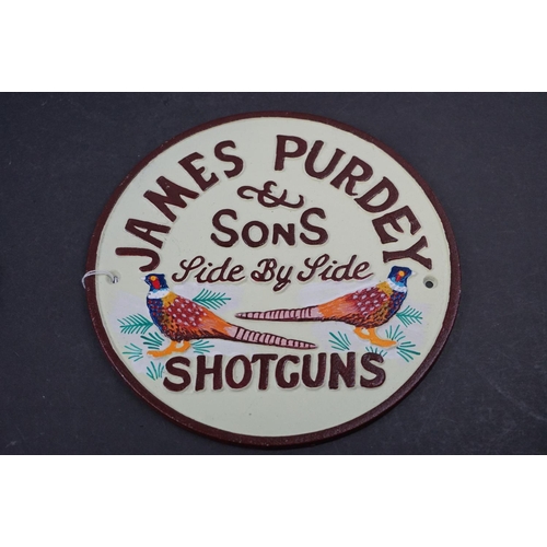 580 - Cast advertising sign, James Purdey Shotguns