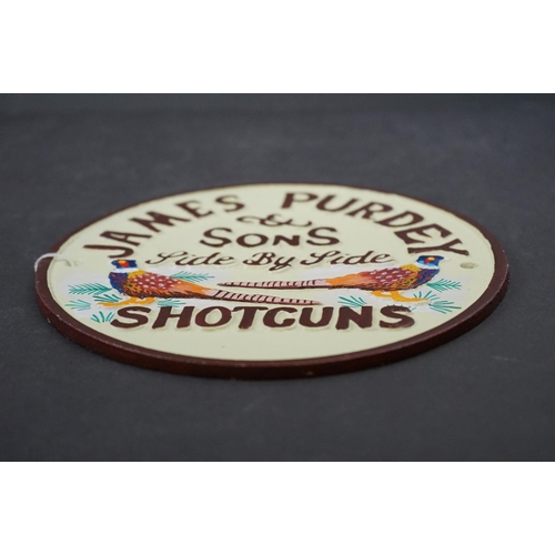 580 - Cast advertising sign, James Purdey Shotguns