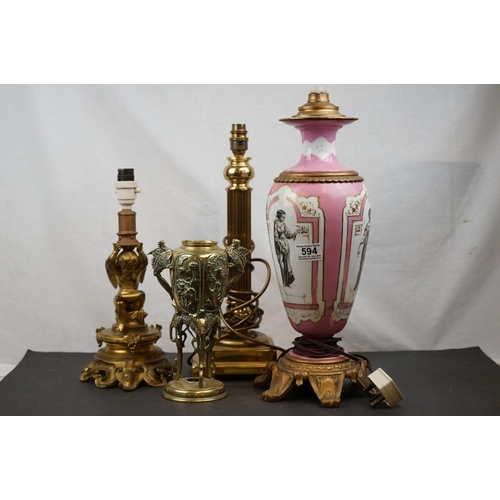 594 - Three brass table lamps to include a brass Corinthian Column and a cherub example together with a br... 