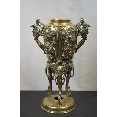 594 - Three brass table lamps to include a brass Corinthian Column and a cherub example together with a br... 