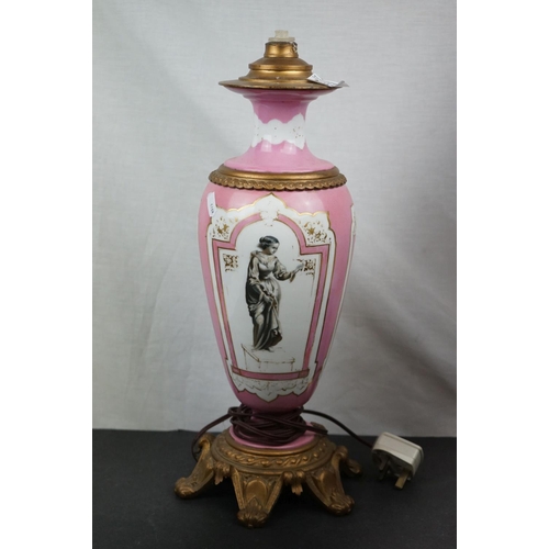 594 - Three brass table lamps to include a brass Corinthian Column and a cherub example together with a br... 