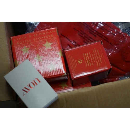 595 - A box of Avon collectables to include bags and napkin rings.