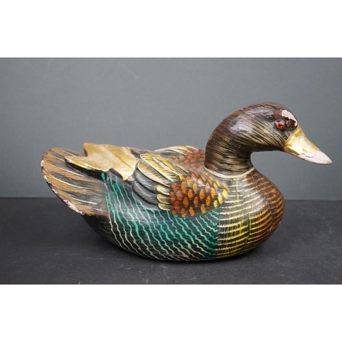 601 - A collection of wooden decorative Duck ornaments.