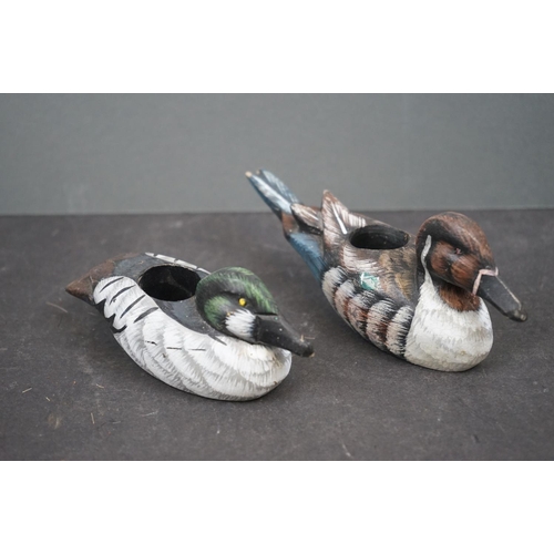 601 - A collection of wooden decorative Duck ornaments.