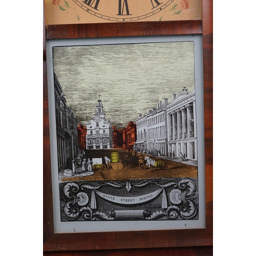 608 - A Vintage American wall clock with a glass panel featuring State Street Boston.