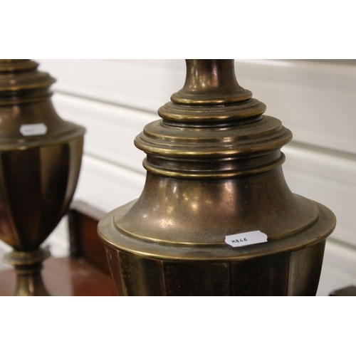 110 - A pair of mid 20th century brass antique style lamps with shades.