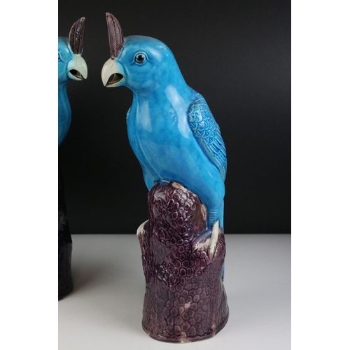 139 - Two Turquoise / Blue Glazed Chinese style Parrots, impressed numbers to base, 35cms high together wi... 