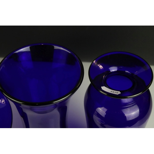 142 - Four items of Bristol Blue Glass including Two Vases, Footed Bowl and a Candle Holder, all etched Br... 