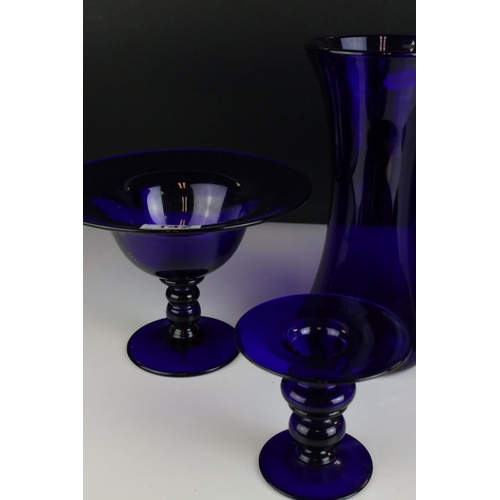 142 - Four items of Bristol Blue Glass including Two Vases, Footed Bowl and a Candle Holder, all etched Br... 