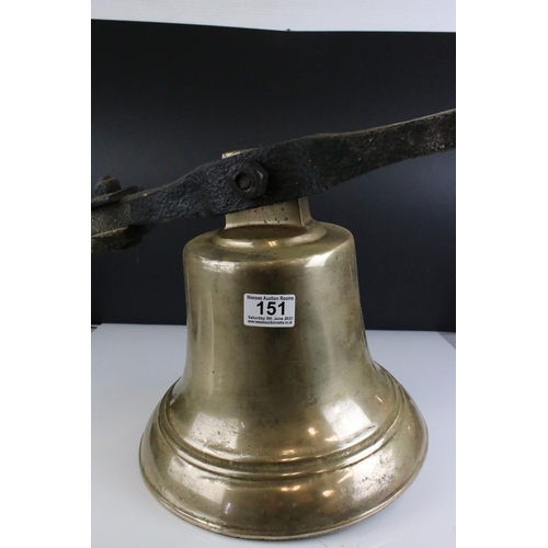 151 - Large Antique Bronze / Bell Metal Bell with Clanger and held on a cast iron bracket, bell 30cms high