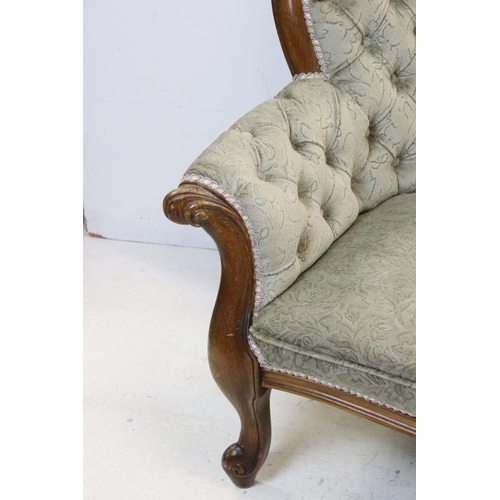 709 - Victorian style Oak Framed Chaise-lounge with button back upholstery, 158cms long