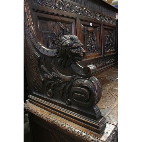 732 - 19th century Oak Hall Bench / Settle in the 17th century manner, heavily carved throughout with tave... 