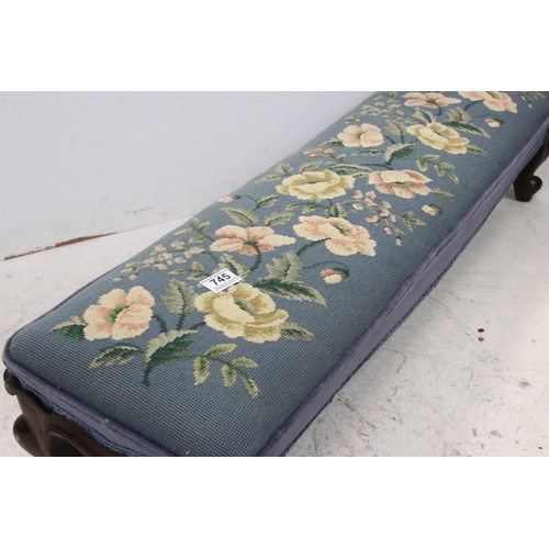 745 - Late 19th / Early 20th century Long Footstool with wool work upholstered top and raised on short scr... 