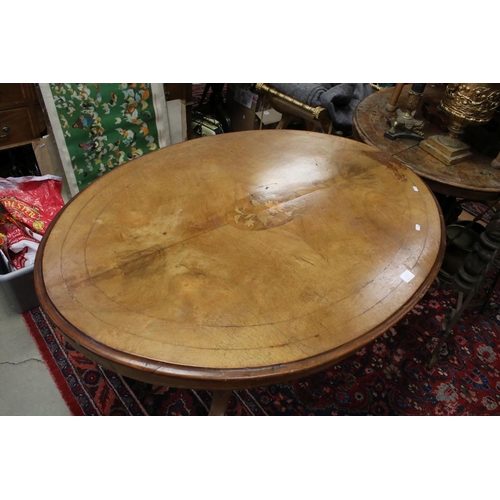 757 - Victorian Walnut Inlaid Tilt Top Oval Loo Table on bulbous supports and four carved scroll legs, 119... 