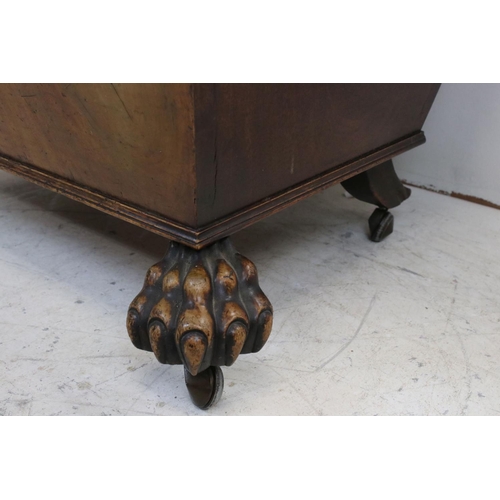 764 - Regency Mahogany Cellarette of sarcophagus form with lion paw carved feet to the front and raised on... 