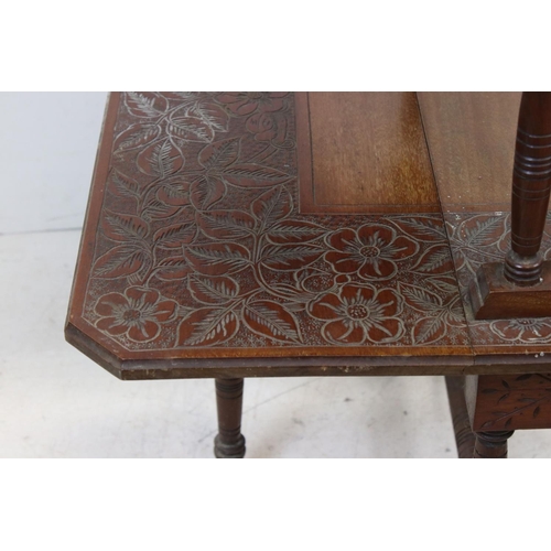 779 - Late 19th / Early 20th century Two Tier Sutherland Table with foliate carving, 58cms high x 58cms lo... 