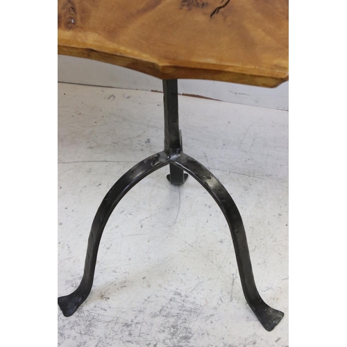 793 - Two Side Tables with shaped wooden tops and raised on wrought iron bases, largest 48cms wide x 65cms... 