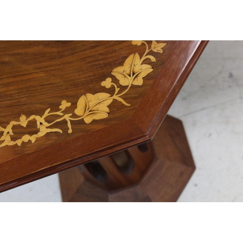 798 - 20th century Octagonal Table inlaid with leaves to the top, raised on a pierced carved pedestal and ... 