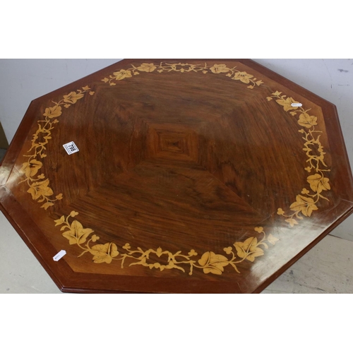 798 - 20th century Octagonal Table inlaid with leaves to the top, raised on a pierced carved pedestal and ... 