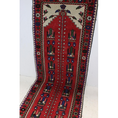 825 - Eastern Red and Cream Ground Wool Hand Knotted Runner Rug, 75cms x 283cms