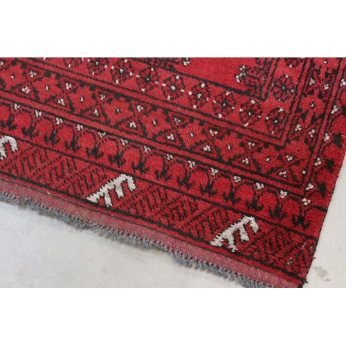 826 - Eastern Red Ground Wool Hand Knotted Runner Rug, 76cms x 280cms