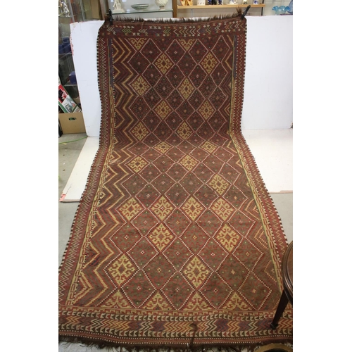 830 - Eastern Red Ground Wool Rug with Geometric Diamond Pattern, approx. 156cms x 330cms