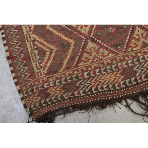 830 - Eastern Red Ground Wool Rug with Geometric Diamond Pattern, approx. 156cms x 330cms