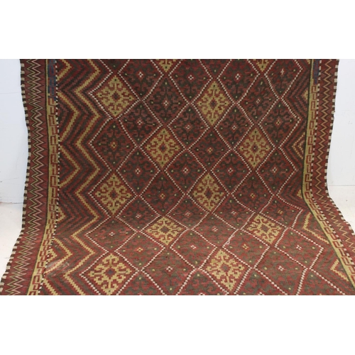 830 - Eastern Red Ground Wool Rug with Geometric Diamond Pattern, approx. 156cms x 330cms