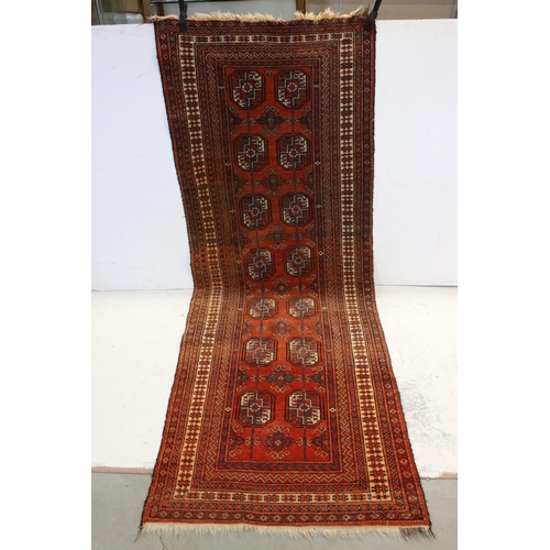 836 - Eastern Red Ground Wool Runner Rug with Geometric Pattern, 242cms x 90cms