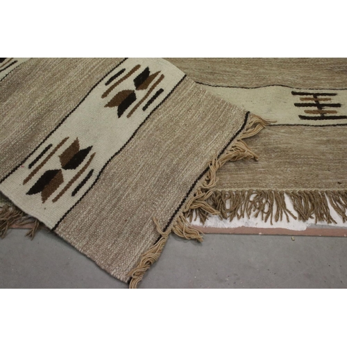 841 - Two Beige and Cream Wool Rugs with stylised pattern, 225cms x 163cms and 147cms x 65cms