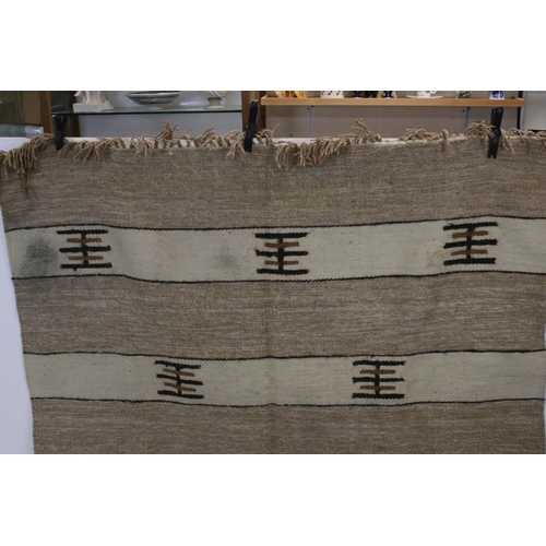 841 - Two Beige and Cream Wool Rugs with stylised pattern, 225cms x 163cms and 147cms x 65cms