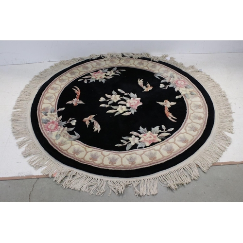 843 - Chinese Hand Knotted Wool Circular Rug, black and cream ground with  pattern of birds and flowers, 1... 