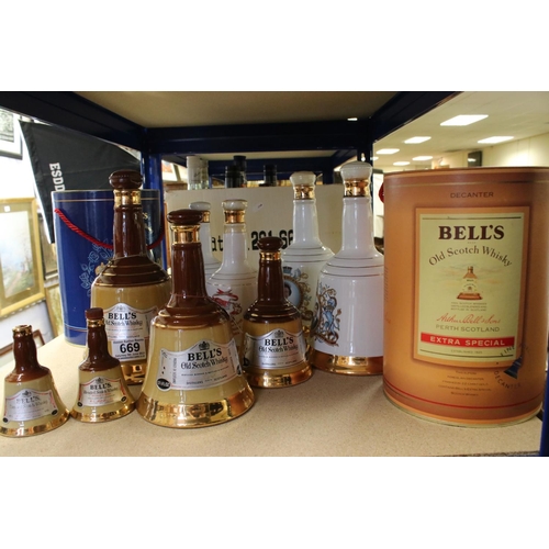 669 - A collection of Bell's Scotch whisky ceramic decanter bottles to include Royal examples.