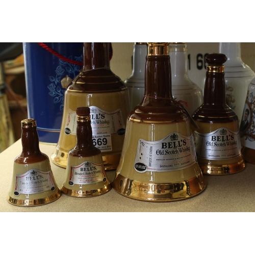 669 - A collection of Bell's Scotch whisky ceramic decanter bottles to include Royal examples.