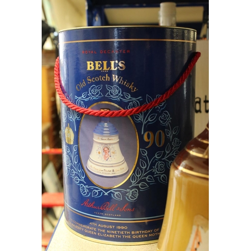 669 - A collection of Bell's Scotch whisky ceramic decanter bottles to include Royal examples.