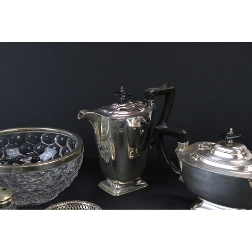 674 - A collection of silver plate to include teapot, coffee pot, cream jug and sugar bowl.