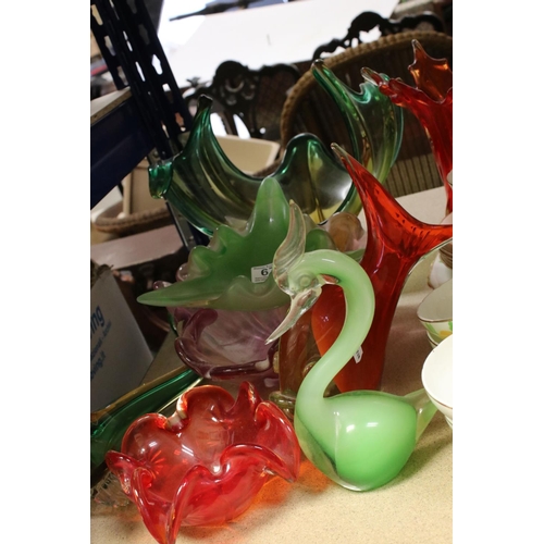 677 - A collection of Murano art glass bowls, vases and figures together with two porcelain tea sets.