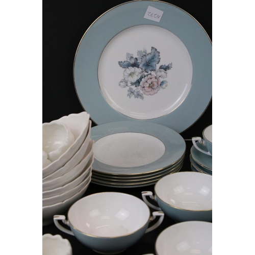 683 - A contemporary Royal Worcester Cynthia part dinner service.