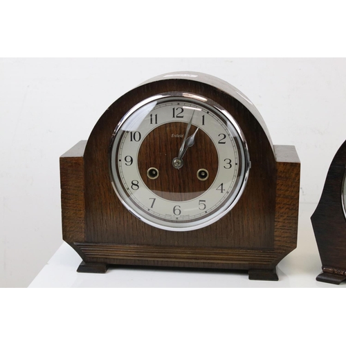 689 - Two wooden Ching mantle clocks to include a Smiths example.