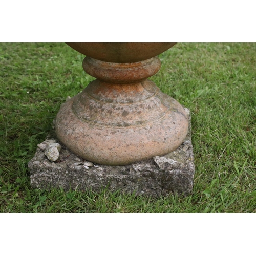 691 - A group of five stone urn shaped lion wall finials. measuring approx 46cm in height. (understood to ... 