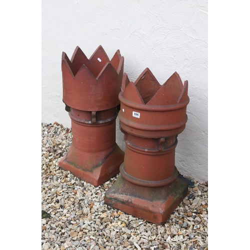 696 - Two large terracotta chimneys, stands approx 70cm in height.