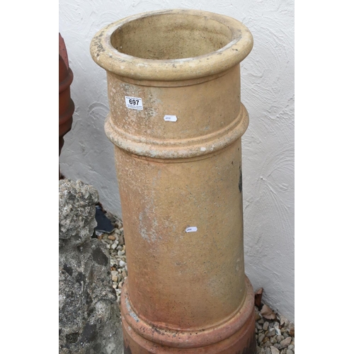 697 - A large terracotta chimney, stands approx 92cm in height.