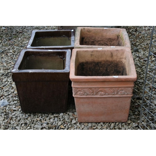 700 - Two pairs of garden planters to include terracotta examples.